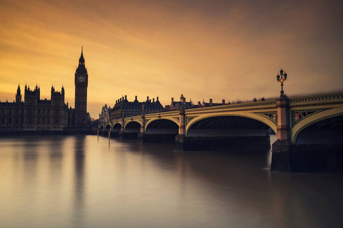 Big Ben and Westminster Bridge beside the Thames at sunset