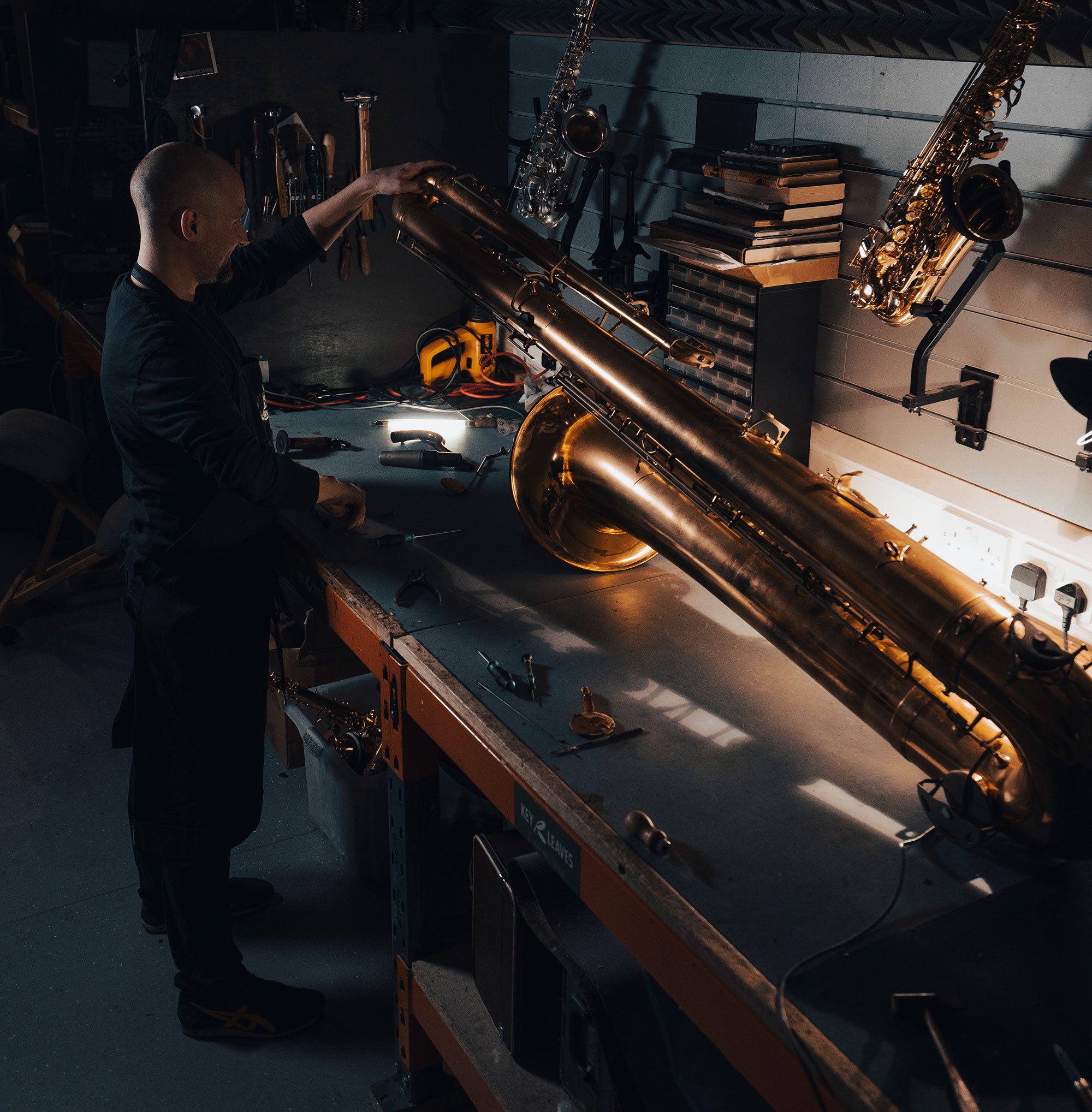 Saxophone being serviced on the SAX workshop bench